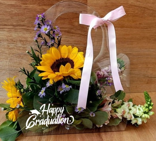 Arreglo de flores con bolsa de acetato - personalizada
